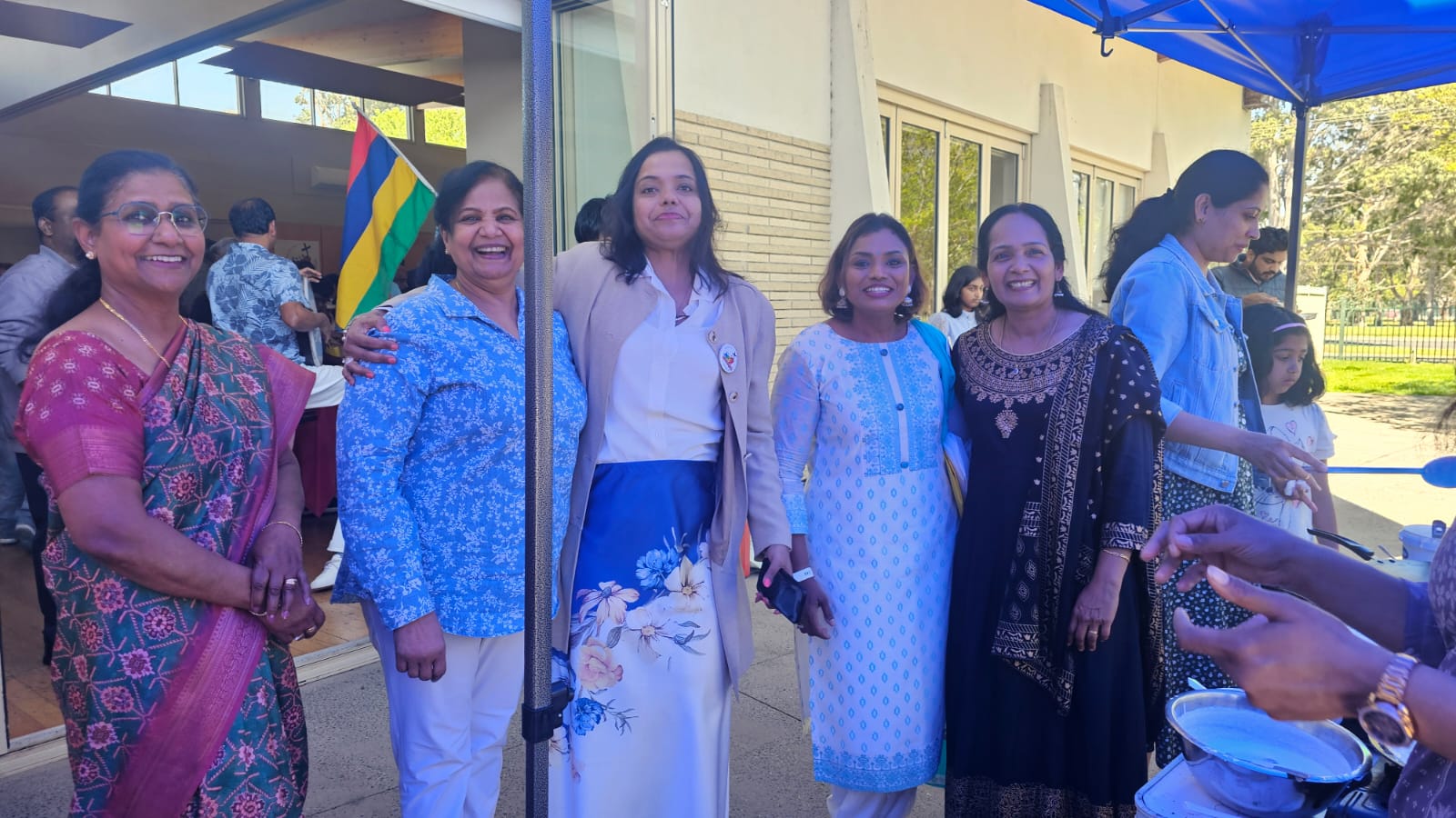 People in a rosary procession outdoors