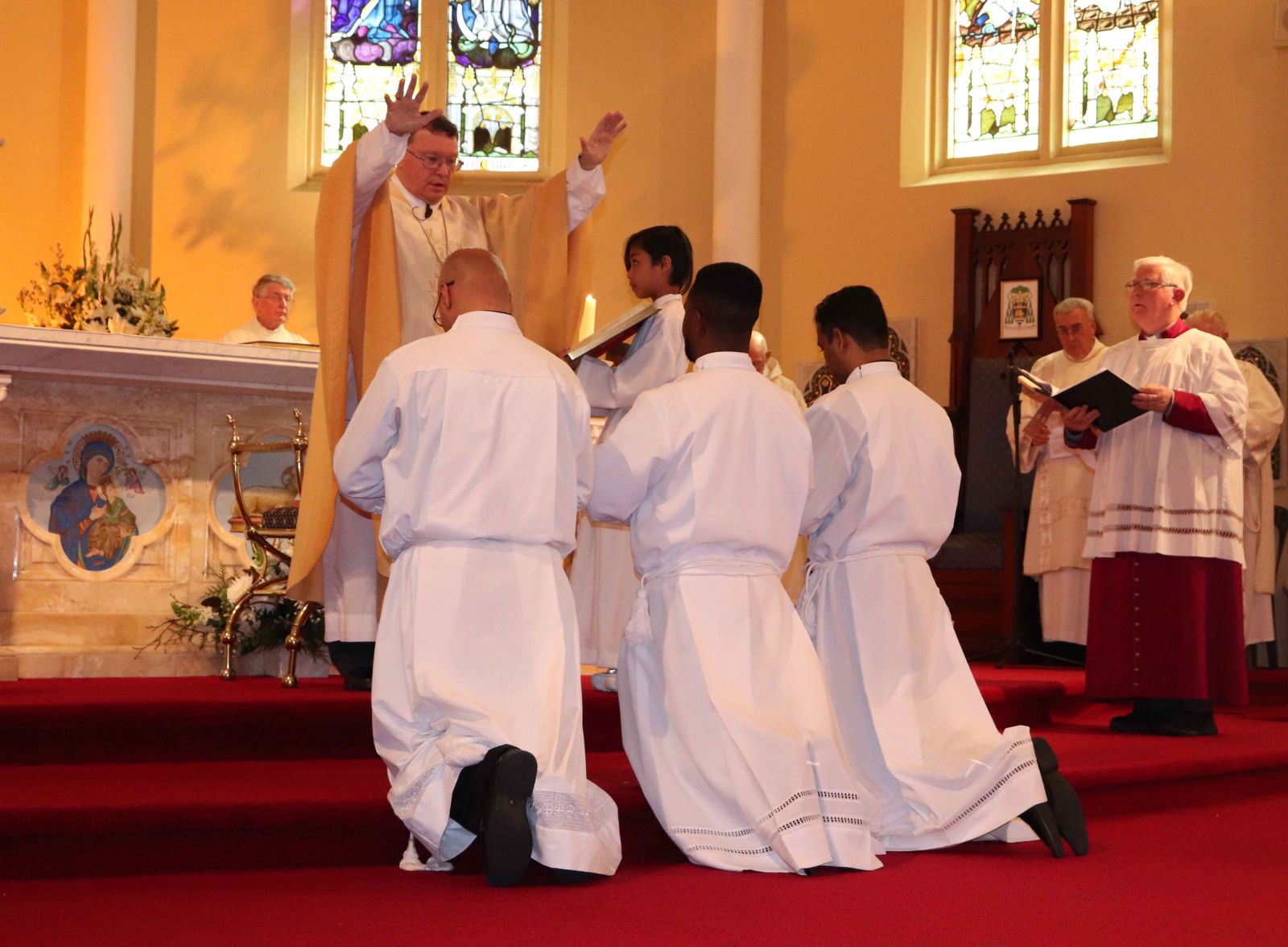 Bishop Patrick O'Regan blesses the candidates